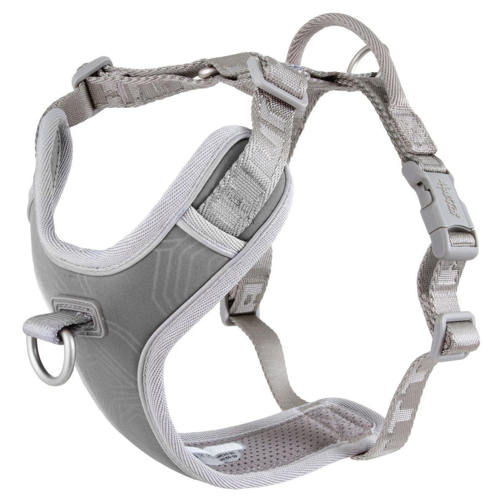 Graues Hundegeschirr mit Polsterung, verstellbaren Gurten, Klickverschlüssen und Metallring, ideal für No-Pull-Training.