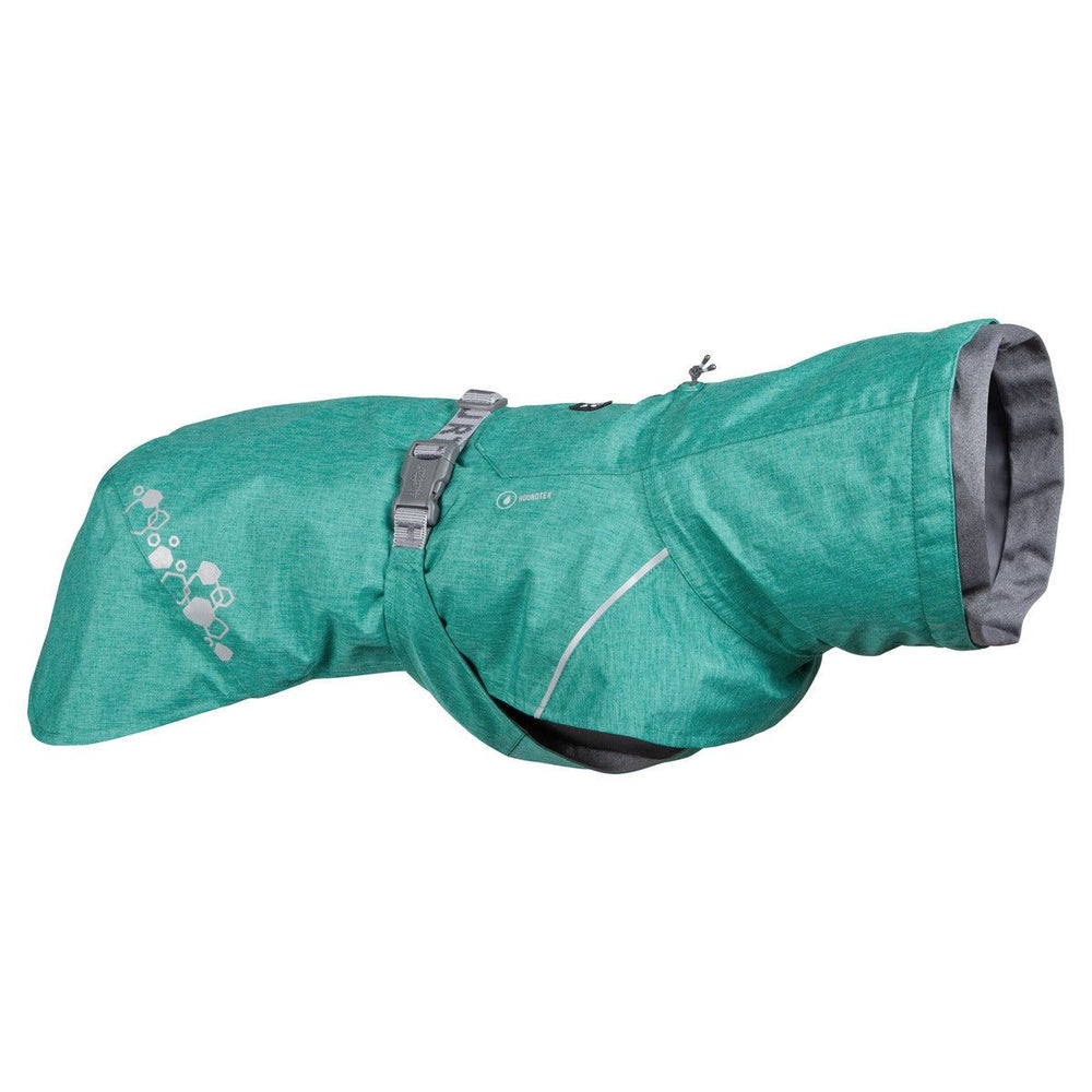 Türkisfarbener Hundemantel Monsoon Coat II ECO mit grauen Details, reflektierenden Elementen und Gurtbefestigung.