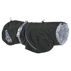 Schwarzer Hunderegenmantel Monsoon Coat mit hellgrauem Innenfutter, reflektierenden Streifen und dekorativen Mustern.