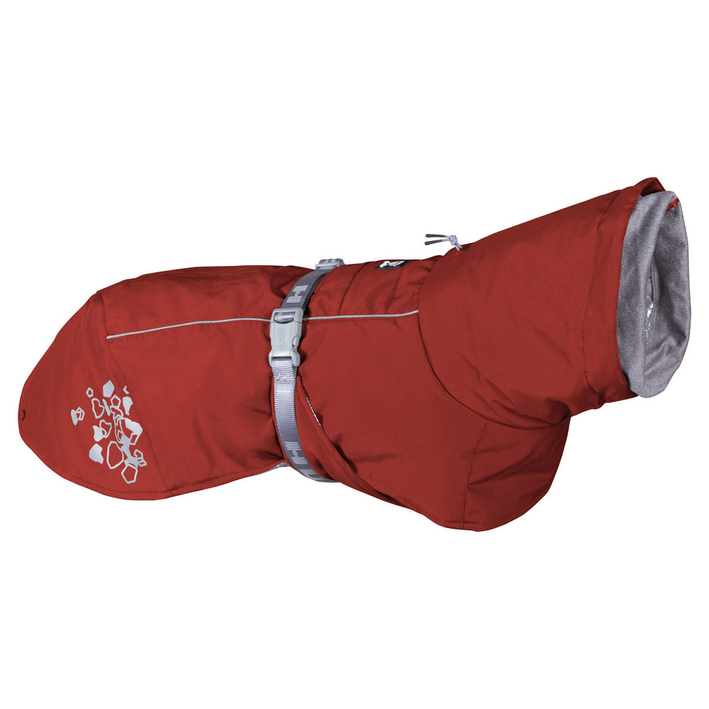Rote Hundejacke mit weichem Futter, verstellbarem Gurtband, Schnalle und reflektierendem Muster für kalte Wintertage.