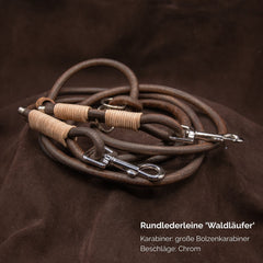 Robuste Rundlederleine "Waldläufer" aus braunem Leder mit großen Bolzenkarabinern und chromfarbigen Beschlägen.
