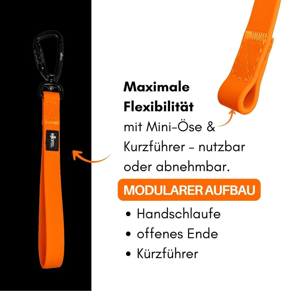 Orangefarbene Hundeleine WOOFLEX® mit Handschlaufe, Kurzführer und flexibler Mini-Öse für Sicherheit und Komfort.