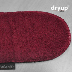 "Dryup® Glove in rötlichem, flauschigem Material – weich und saugfähig für optimalen Komfort."