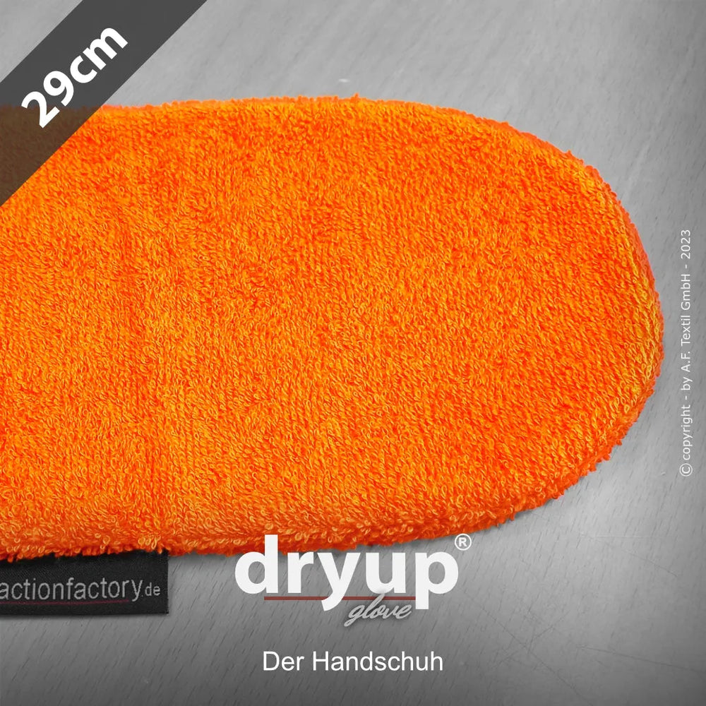 Orangefarbener Mikrofaser-Handschuh "Dryup® Glove" in abgerundeter Form auf neutralem Holzstruktur-Hintergrund.