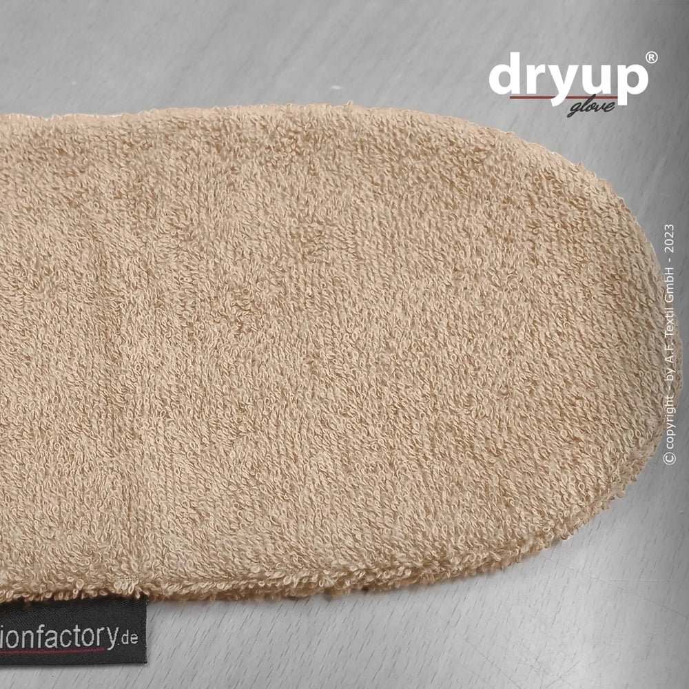 Beige Dryup® Handschuh mit frotteeartiger Oberfläche auf hellem Untergrund, ideal für trockene Hände.