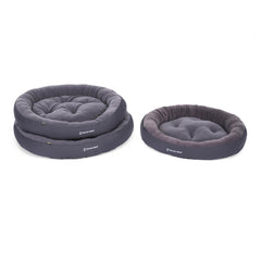 Runde, gepolsterte Hundebetten in dunklen Grautönen, ideal für komfortable Ruheplätze.