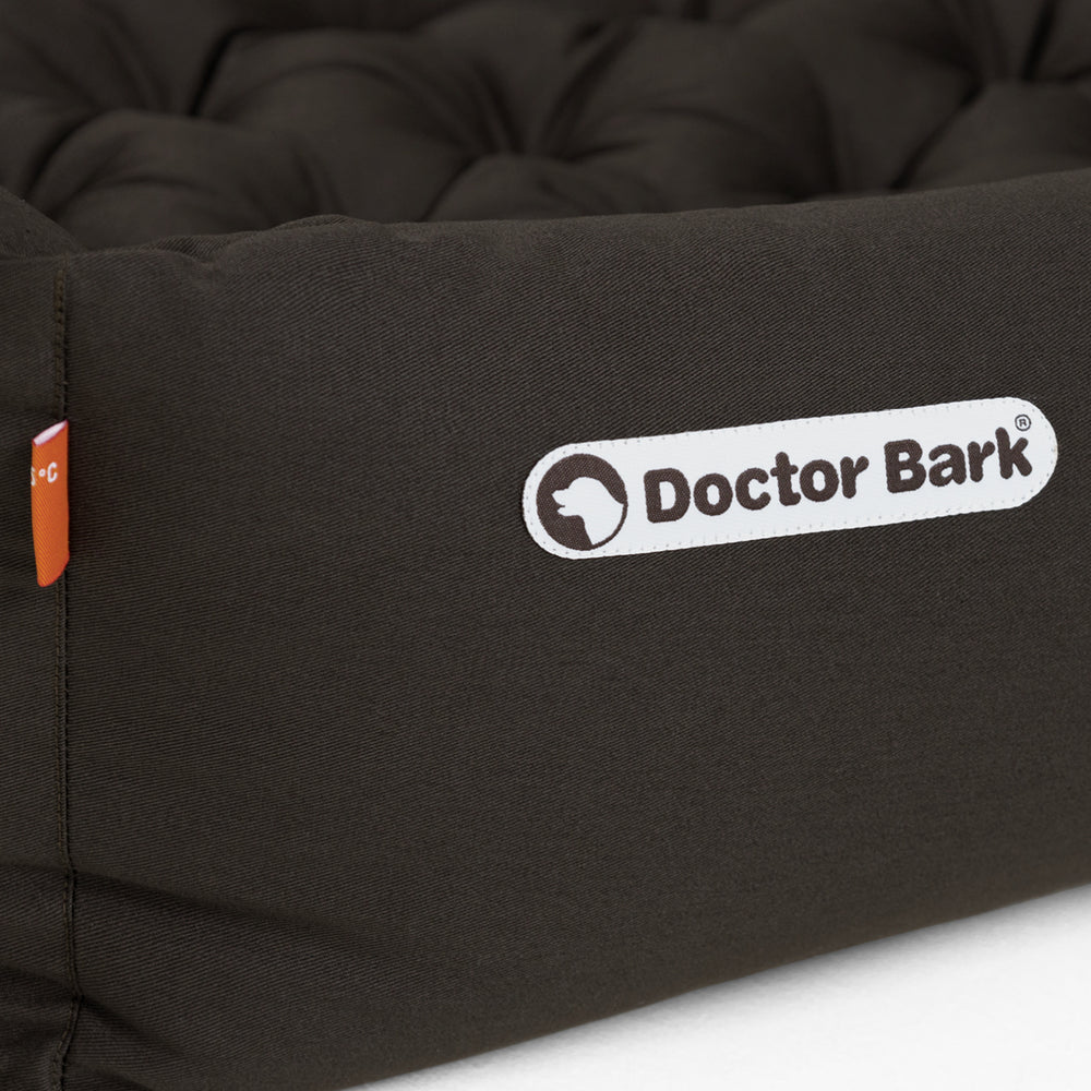 Robustes Doctor Bark orthopädisches Hundebett in dunklem, gestepptem Design für optimalen Komfort.