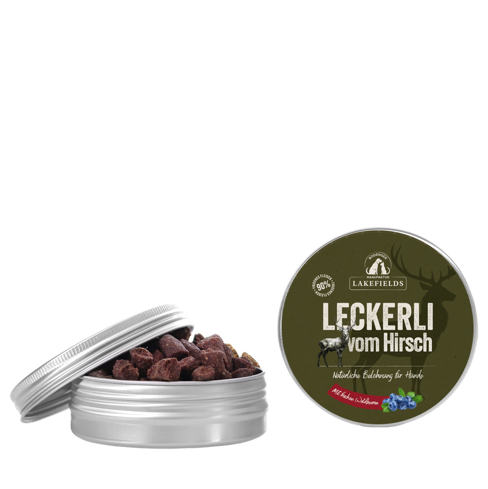 Hunde-Leckerli vom Hirsch in dekorativer Dose mit teilweise geöffnetem Deckel, ideal für vierbeinige Freunde.