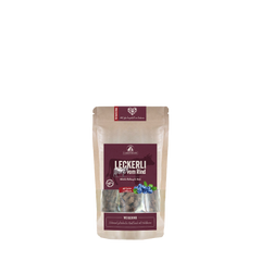 Verpackung der Rinder-Leckerli mit transparentem Sichtbereich und buntem Etikett aus kraftpapier.