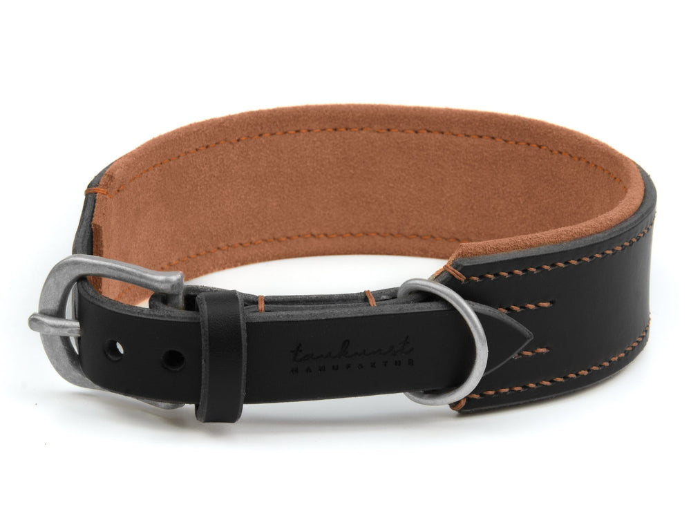 Hochwertiges schwarzes Lederhalsband für Hunde mit hellbrauner Innenseite und stabiler Metall-Schnalle, robust verarbeitet.