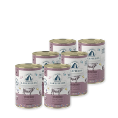 Nassfutter für Welpen mit Rind von Lakefields: Sechs lila Dosen mit bunten Designs und Weiderind als Hauptzutat.
