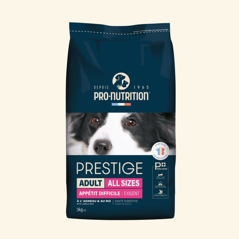 "3 kg Packung Prestige Adult Exigent Hundefutter mit Lamm & Reis, blaue Verpackung und Hundebild."