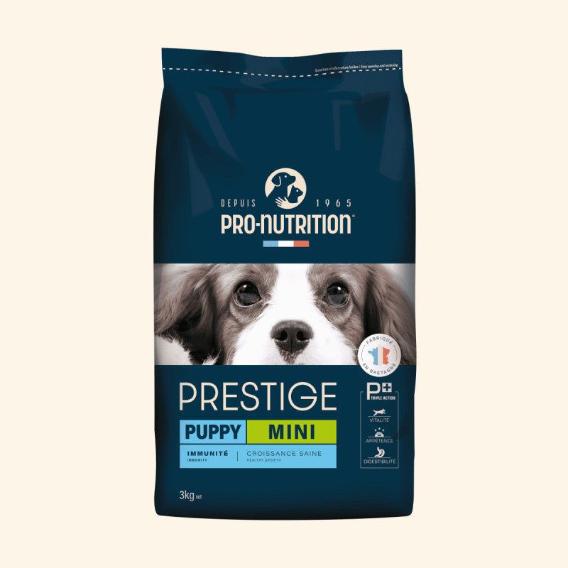 Hundefutter für Welpen von Pro-Nutrition Prestige, 3 kg, mit blauem Design und Bild eines kleinen Hundes.
