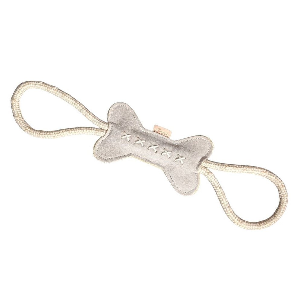 Nachhaltiges Hundespielzeug Knochen Kurt mit Seil in hellem Design, ideal für Zerr- und Kau-Spiel mit Hunden.