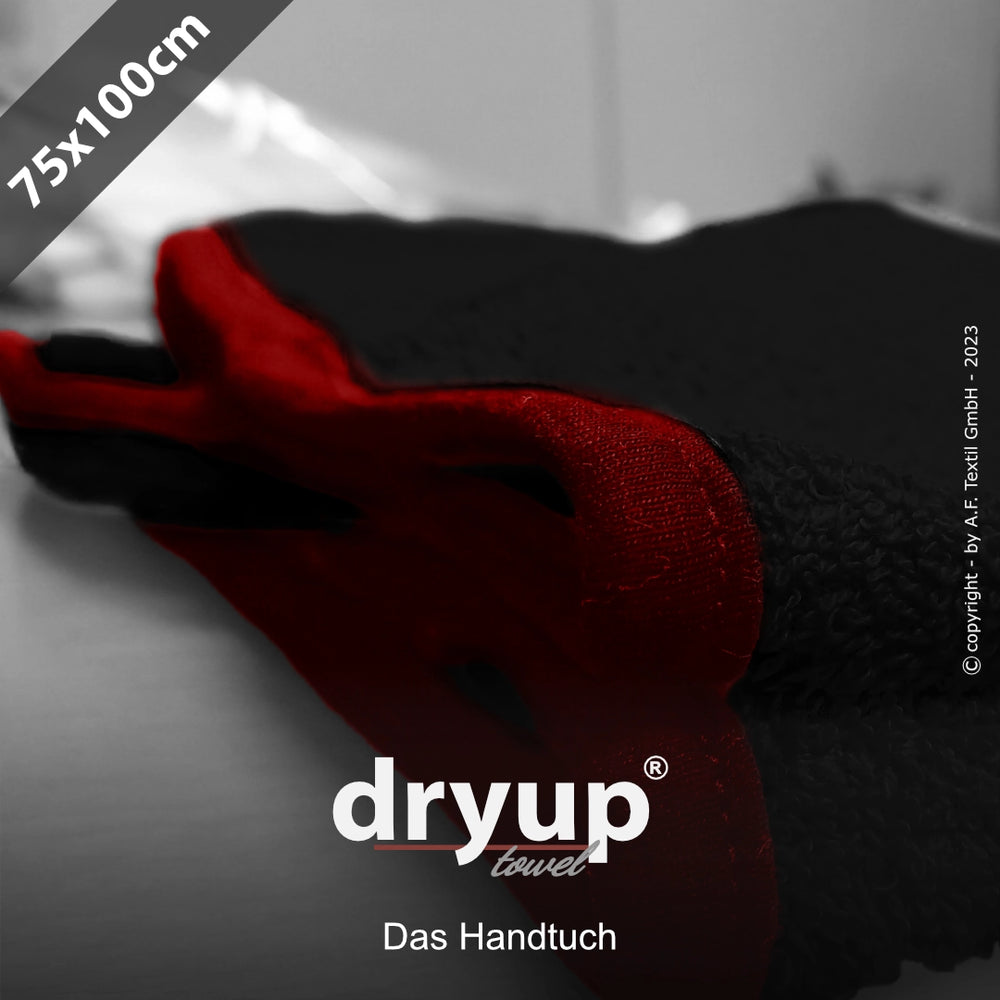 Schwarzes Dryup® Handtuch 75x100 cm mit roten Akzenten und Logo auf neutralem Hintergrund.