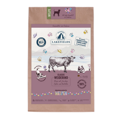 Trockenfutter für Welpen mit Rind von Lakefields, verpackt in einer braunen Tüte mit bunten Hundeillustrationen.