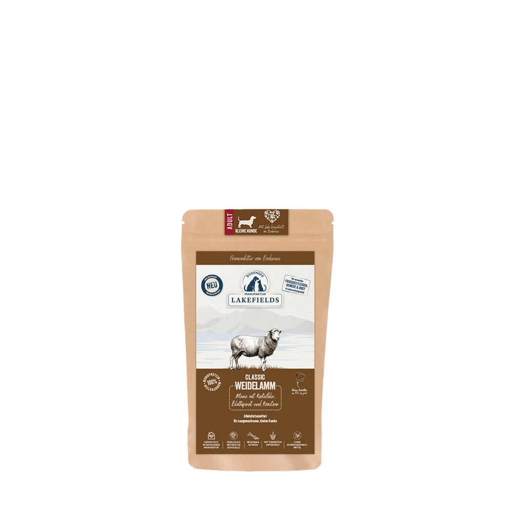 "Packung Lakefields Trockenfutter für Hunde mit Weide-Lamm, braun, mit Neuheitssymbol und Zutateninformationen."