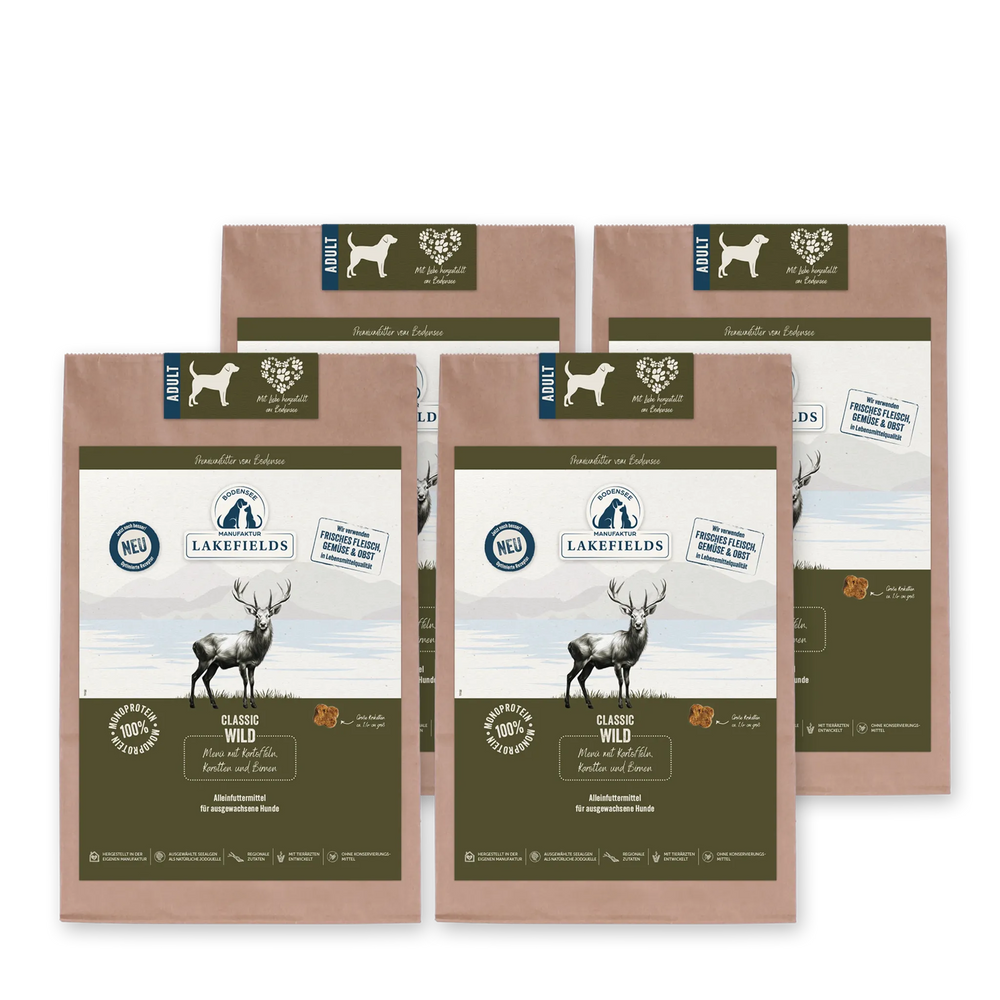 "Lakefields Trockenfutter-Menü Wild für Hunde - vier braune Verpackungen mit Hirschabbild und Informationen zu 'Adult Wild'"