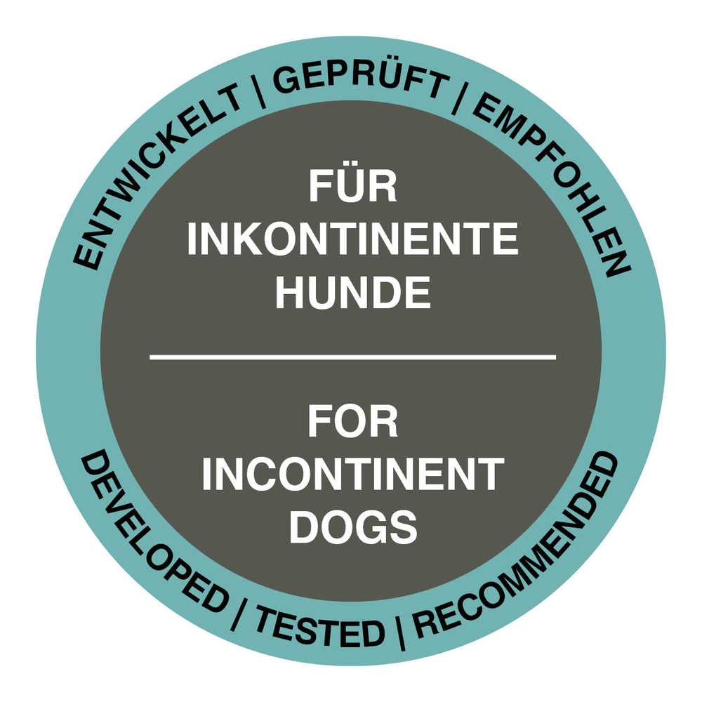Rundes Etikett für Doctor Bark Matratze, entwickelt für inkontinente Hunde, mit den Worten "Entwickelt | Geprüft | Empfohlen".
