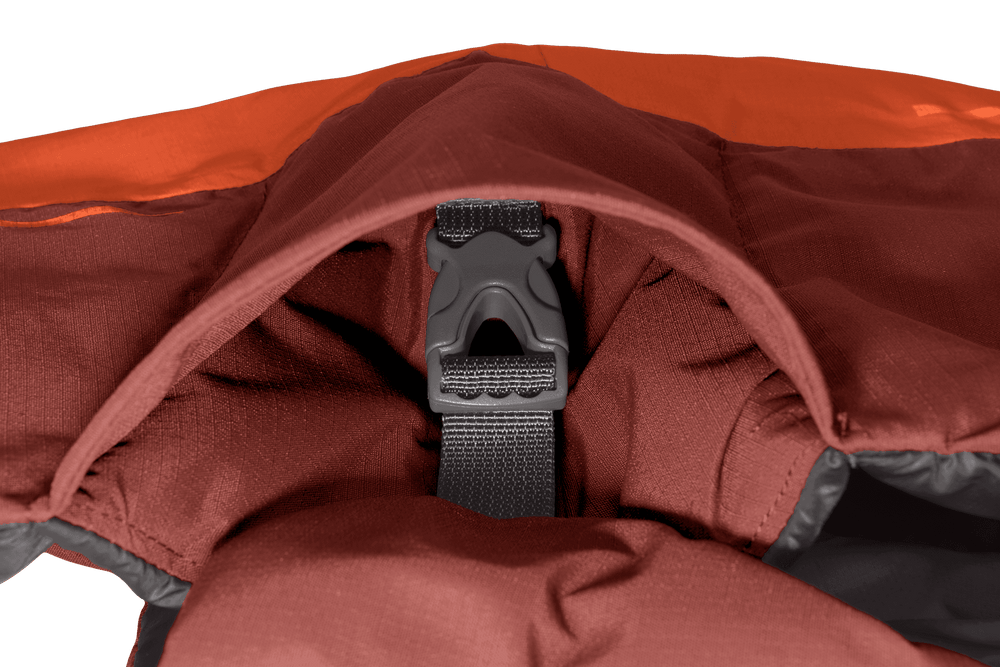 Innenansicht der Vert™ Jacke mit rotem Kragen, orangefarbenem Akzent und Kunststoffverschluss.