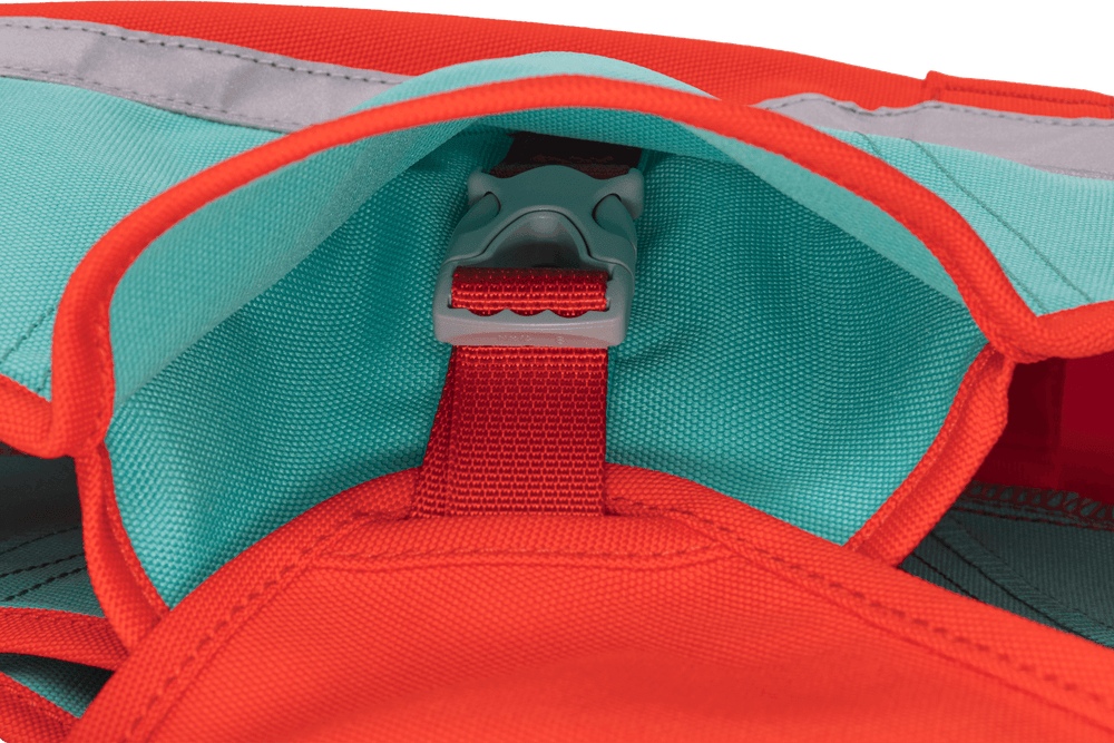 Innenseite der Lumenglow™ Sicherheitsweste mit orange-türkis Design und grauem Verschluss, rote Gurtelemente für Sicherheit.