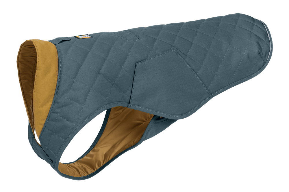 Blauer gesteppten Hundemantel Stumptown™ mit goldenem Innenfutter, ideal für kühle Tage.