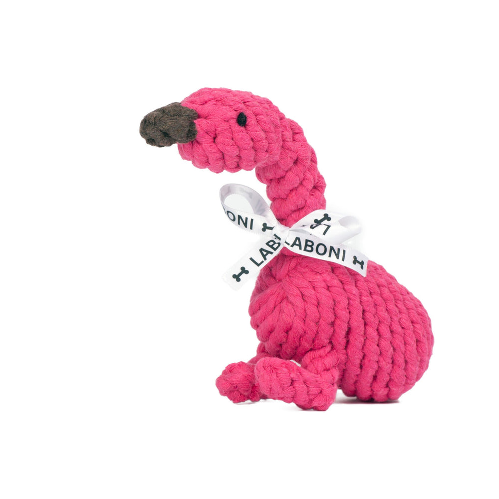 ALT-Text: Pinker Flamingo für Hunde aus geflochtenem Material mit Schleife – das perfekte Kult-Spielzeug für tierische Freunde.