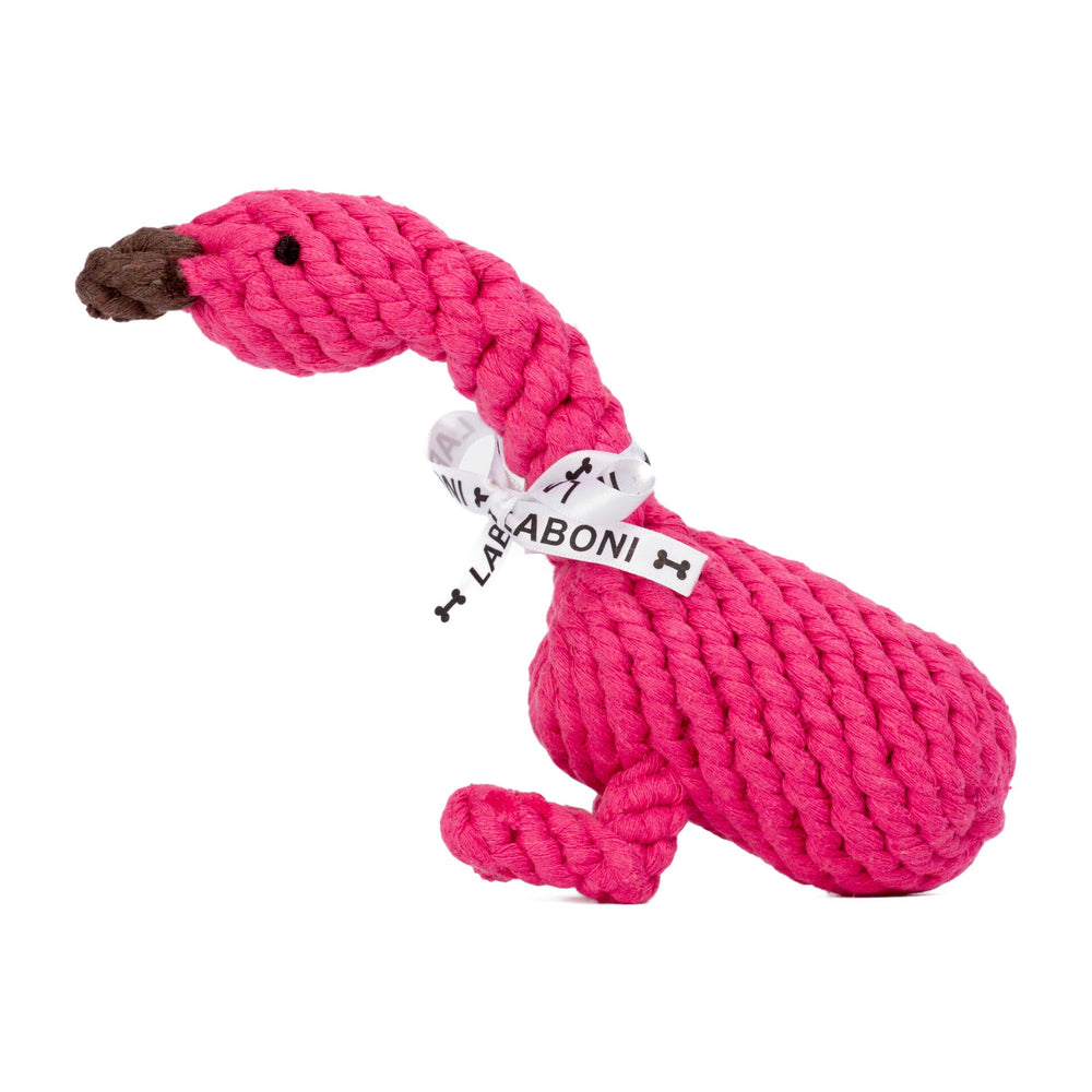 "Franzi Flamingo: pinkes Hundespielzeug aus gewebtem Material mit Schleife und dunklem Schnabel für Spaß und Spiel."