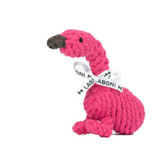 ALT-Text: Pinker Flamingo für Hunde aus geflochtenem Material mit Schleife – das perfekte Kult-Spielzeug für tierische Freunde.