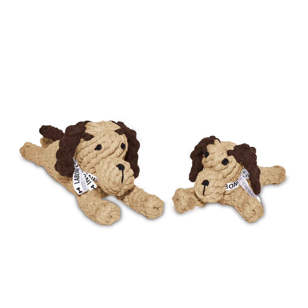 ALT-Text: Kult-Spielzeug für Hunde, liegende Hunde aus rope-artigem Material in beige mit braunen Ohren – ideal zum Spielen und Kauen.