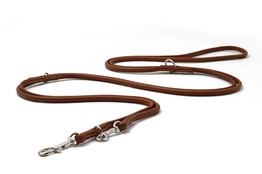 Braune rundgenähte Lederleine für Hunde, 3m lang, mit stabilem Karabiner und komfortabler Griffsleife.