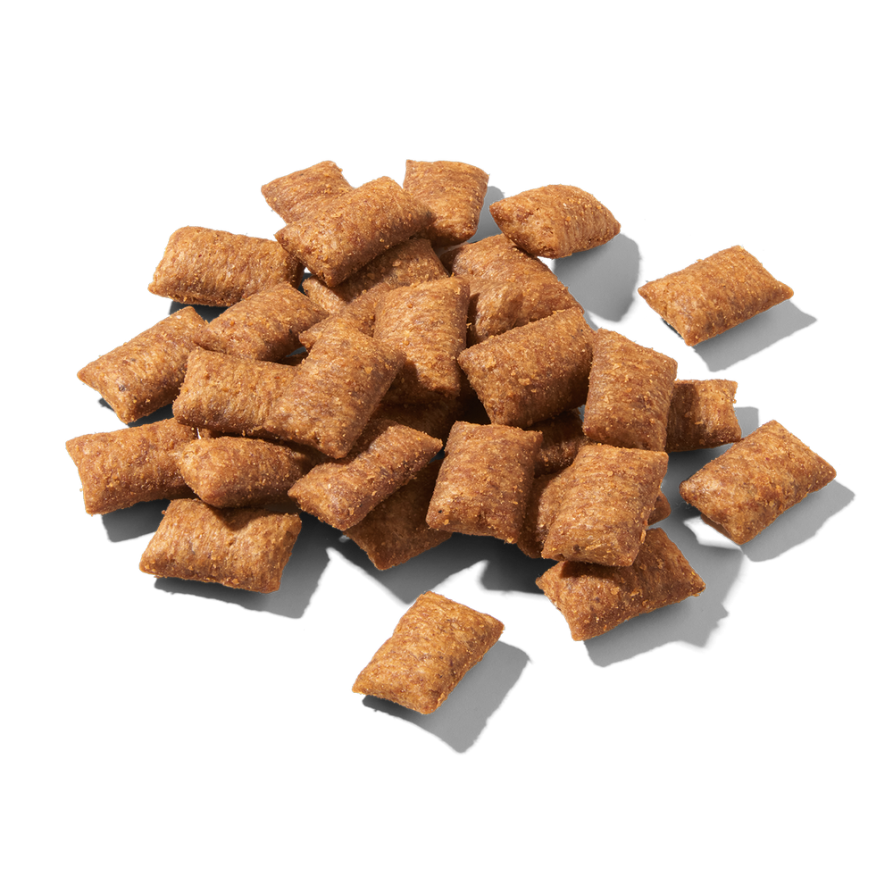 Knusprige FELIA Knusperkissen in rechteckiger Form, ideal als Snack für zwischendurch oder zum Knabbern.