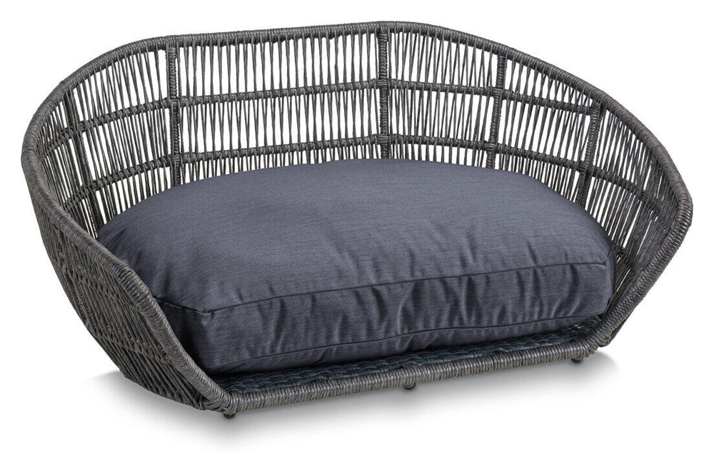 Stylisches ovales Hundebett CHIC aus rattanartigem Geflecht mit dunkelgrauer Polsterauflage für optimalen Komfort.