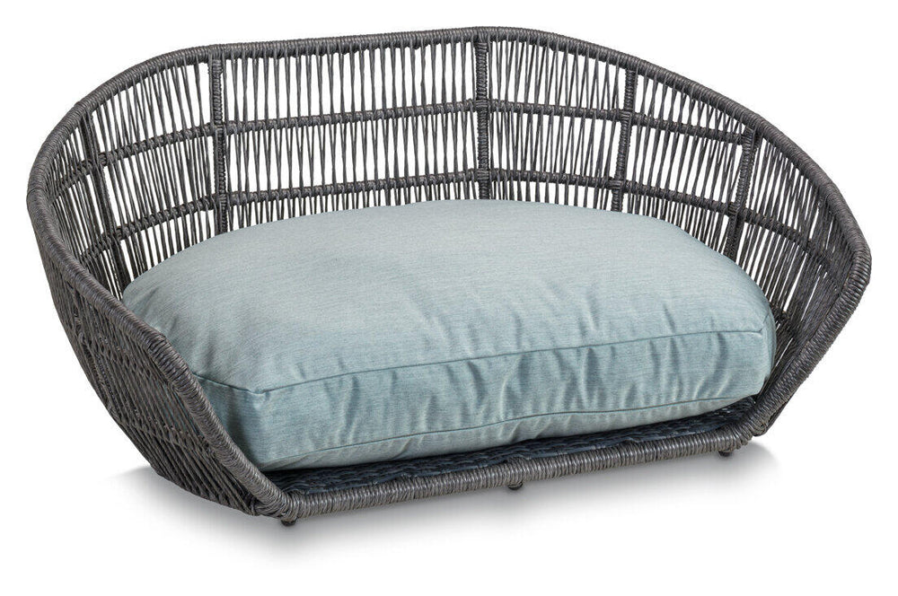 Hunde- oder Katzenliege PRADO CHIC in grau mit ovaler Form und hohen Wänden, gepolstert mit hellblauem Kissen.