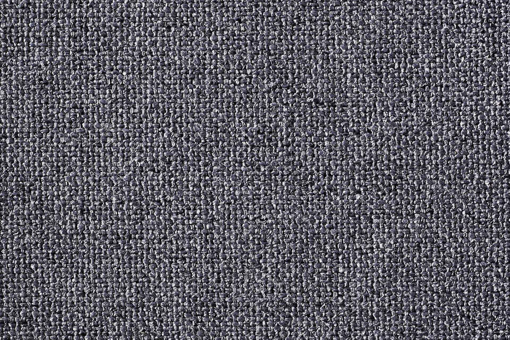 ALT-Text: Nahaufnahme des CLASSIC Hundebetts VITO in strapazierfähigem, strukturiertem grauem Stoff.