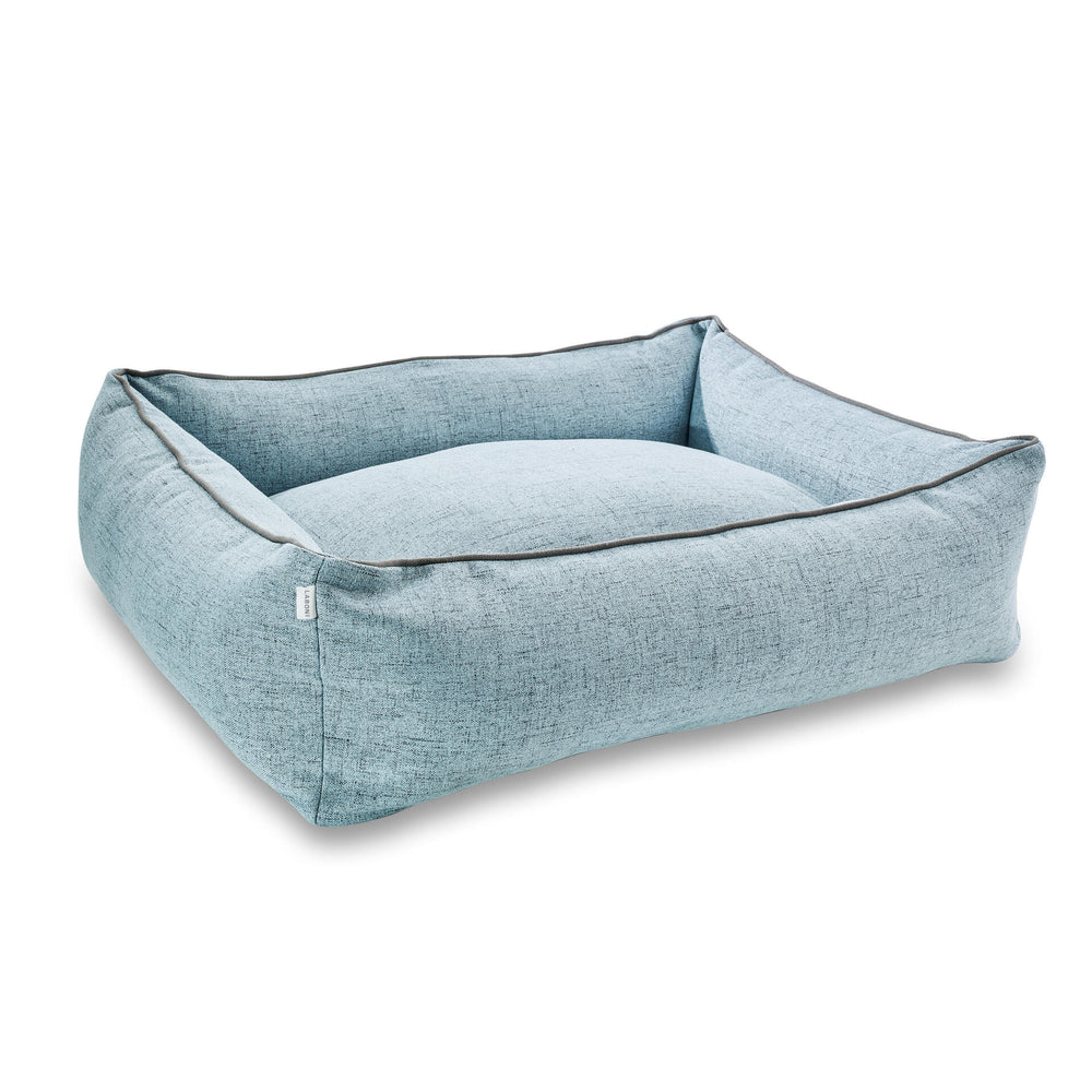 Rechteckiges CLASSIC Hundebett VITO in hellblau mit grauem Rand und weicher Polsterung für optimalen Komfort.
