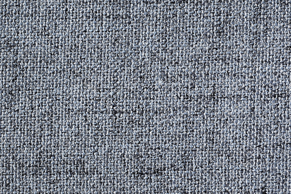 Strukturierte graue Textiloberfläche des ORTHO Hundebetts VITO mit dichten, robusten Fasern.