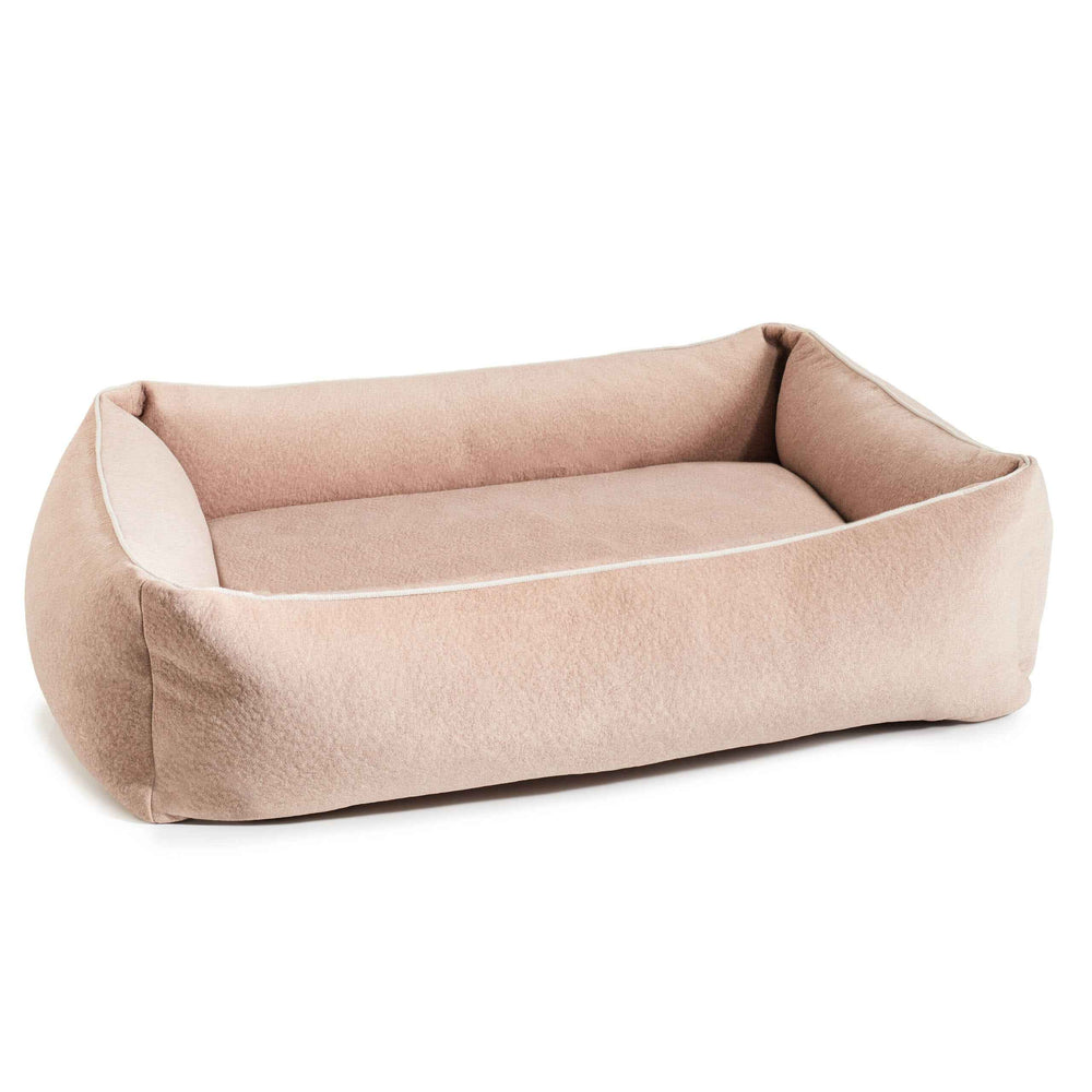 Beige ORTHO Hundebett BUFFALO mit erhöhten Seitenwänden für Komfort und Sicherheit, aus weichem, flauschigem Material.