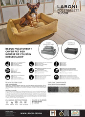 ALT-Text: Gelbes CLASSIC Hundebett "Tudor" von Laboni mit gemusterter Oberfläche und Französischer Bulldogge.
