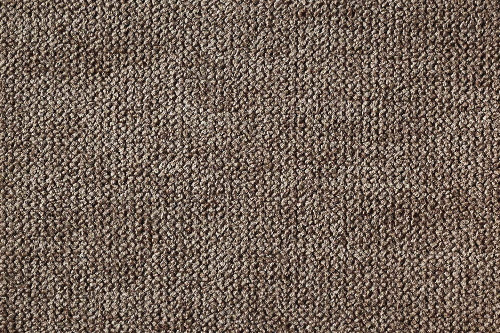 Nahaufnahme des ORTHO Hundebetts SCALA in dunkelbraunem, strukturiertem Teppich mit weicher, langlebiger Oberfläche.