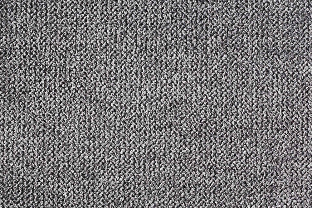 ALT-Text: Weiches, graues ORTHO Hundebett SCALA mit strukturierter Oberfläche aus dicht gewebtem Material für optimalen Komfort.