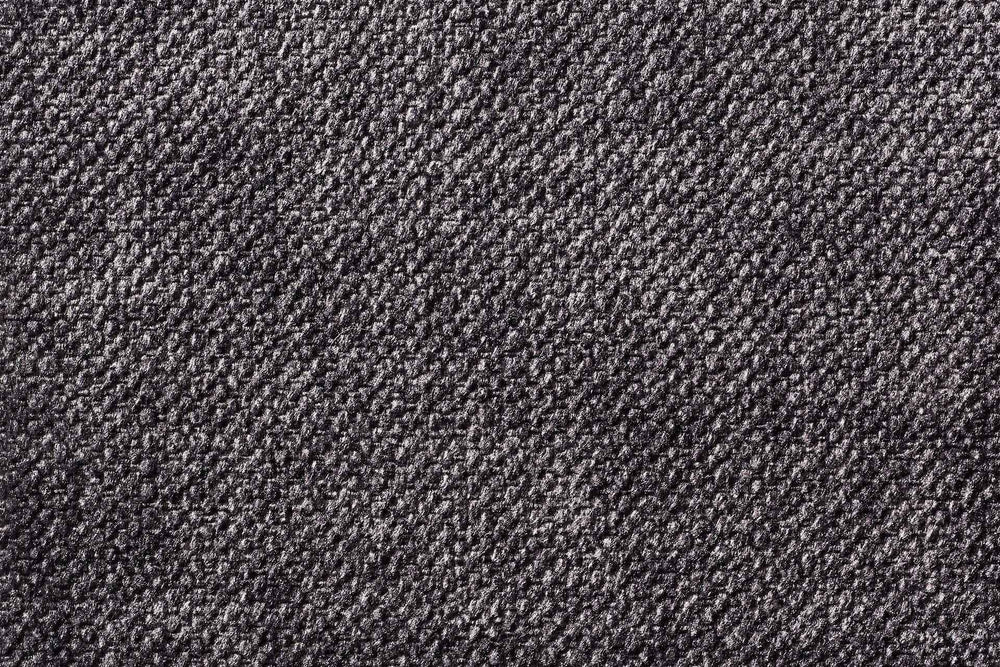 Dunkelgraues ORTHO Hundebett GLAM aus robustem, strukturiertem Stoff mit glänzenden und matten Oberflächen.