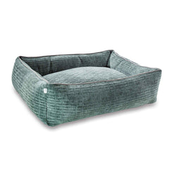 Gemütliches CLASSIC Hundebett NOVA in sanftem Grün mit hohen, gepolsterten Seiten und weichem, gesteppten Boden.
