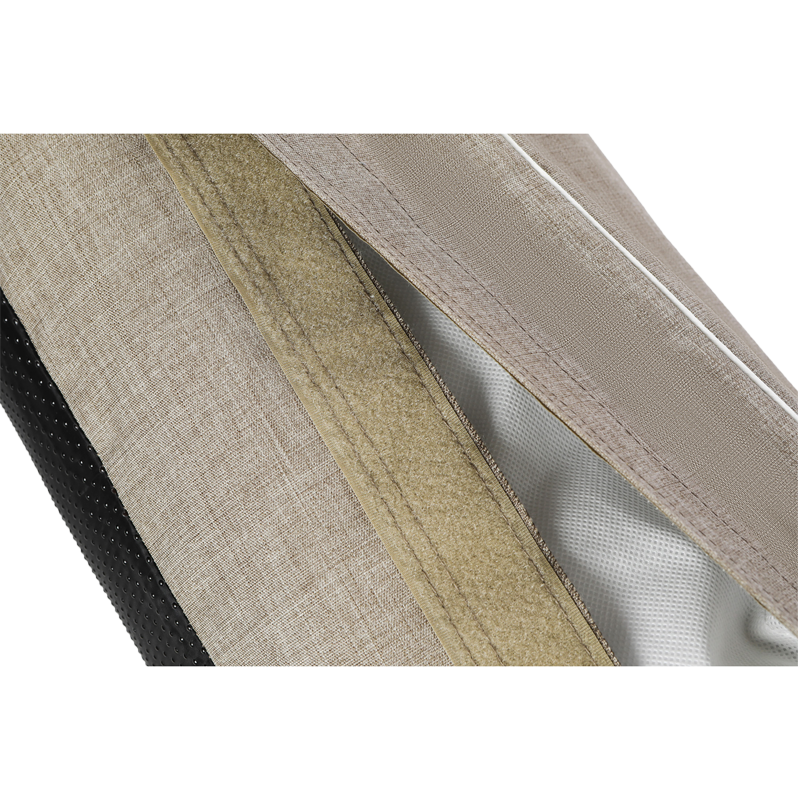Vielseitige Textiloberfläche in Beige, Grau und Schwarz mit unterschiedlichen Stoffstrukturen.