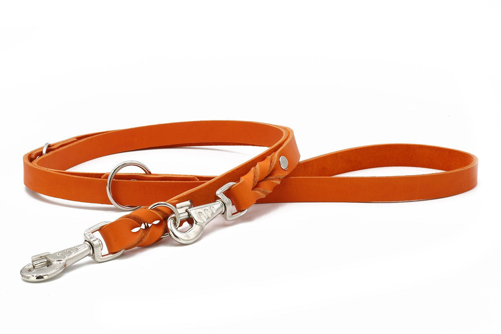 "Orangefarbene Lederleine Mono Pop Herbst Edition mit geflochtenem Teil und stabilem Karabinerhaken."