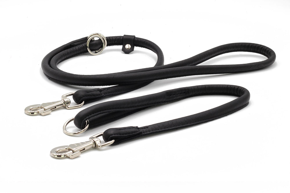 Drei schwarze, rundgenähte Hundeleinen aus Leder in verschiedenen Längen mit stabilen Karabinern und hochwertiger Verarbeitung.
