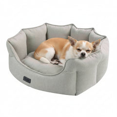 Hundefreundliches ovales Bett "VALEA" in hellem Grau, weich gepolstert und blütenförmig gestaltet, ideal für kleine Hunde.