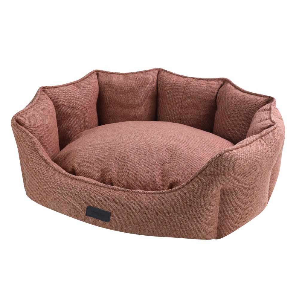 Komfortables, ovales Hundebett "ANDA" in rötlicher Farbe mit hohen Wänden und weicher Liegefläche für Hunde.