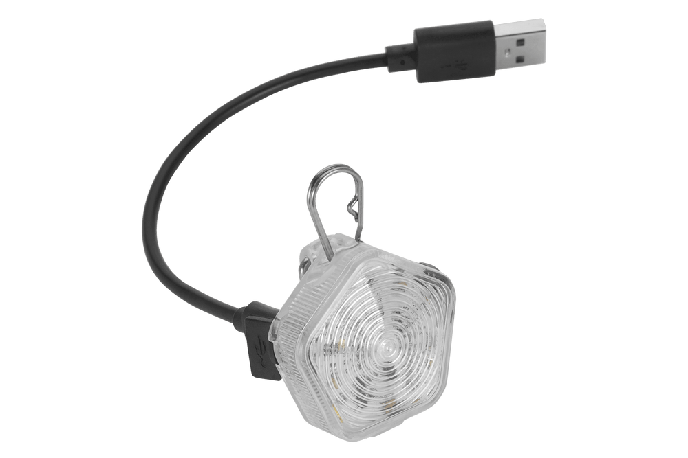 Kleine tragbare LED-Lampe Beacon™ für Hunde mit Clip und USB-Kabel in transparentem Design.