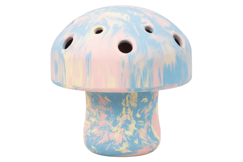 „Pastellfarbenes Porcini™ Hundespielzeug in Form eines stilisierten Pilzes mit Löchern und kuppelartigem Kopf.“